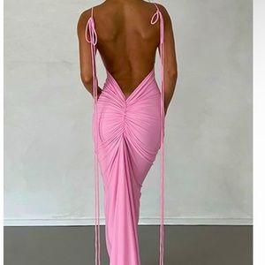Selling this beautiful pink open back